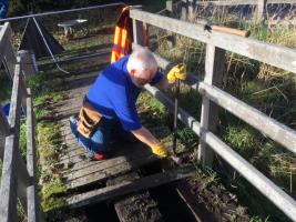 member repairing bridge